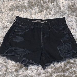 Black ripped American eagle shorts